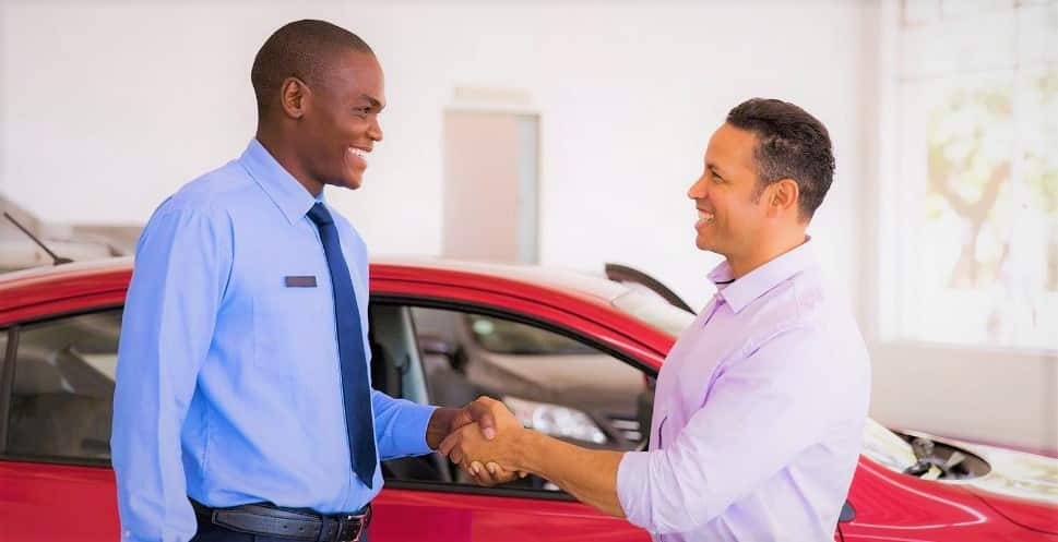 Man in South Africa selling a car to a dealership